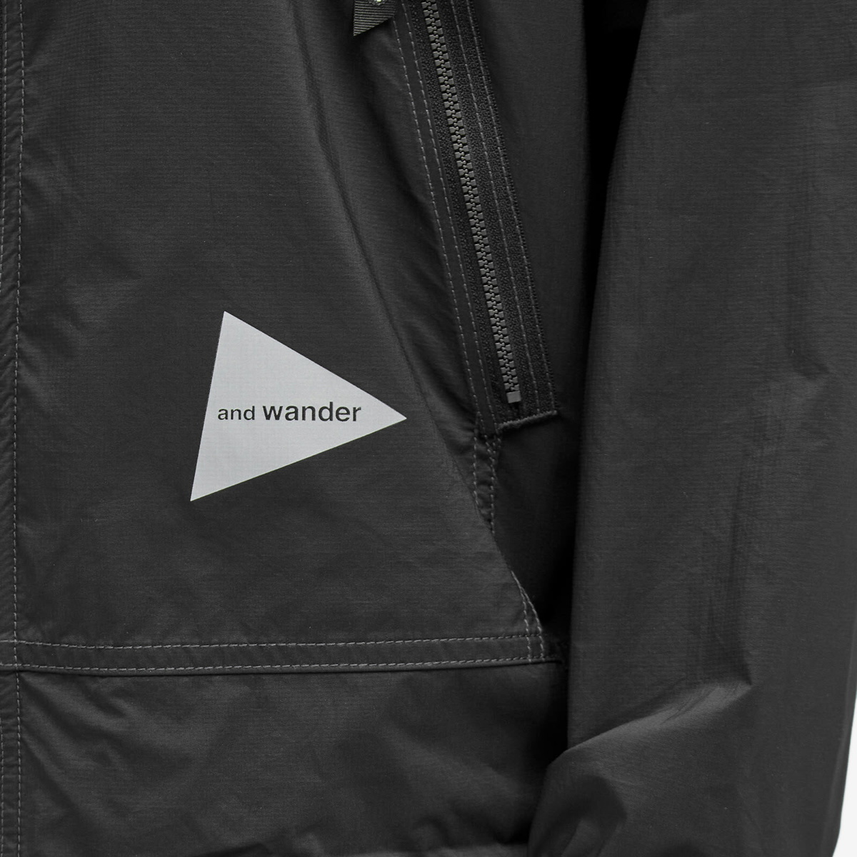 Photo: and wander Men's Pertex Wind Jacket in Black