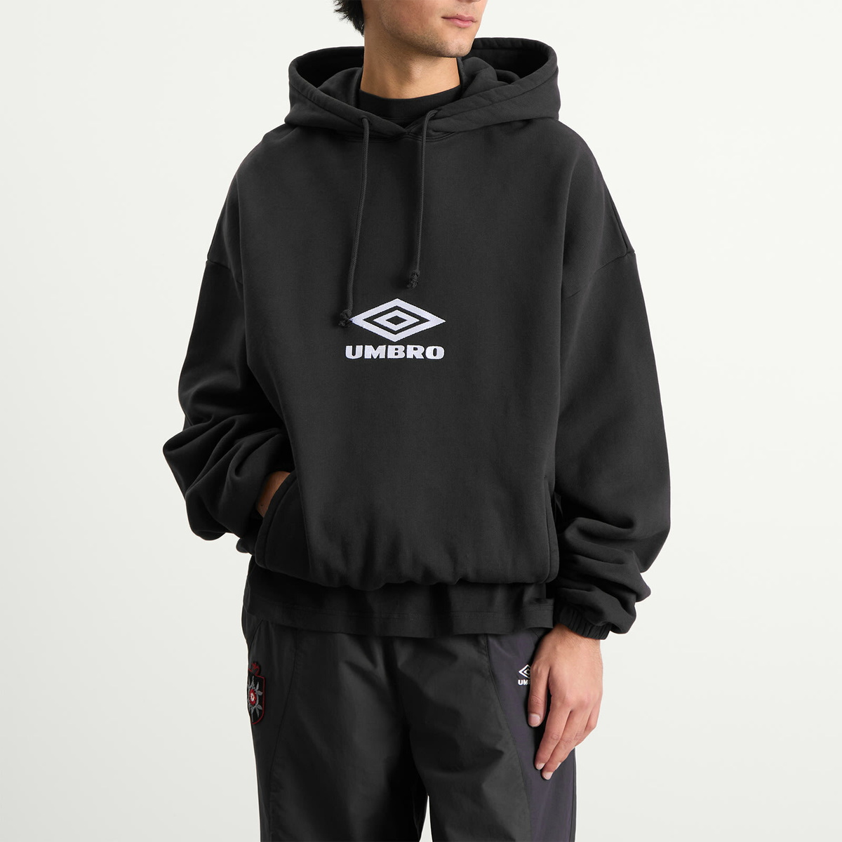 Umbro by Slam Jam Men's OG Logo Mask Hoodie in Washed Black
