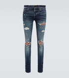 Amiri - Distressed skinny jeans