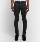 AMIRI - Skinny-Fit Panelled Distressed Stretch-Denim Jeans - Black