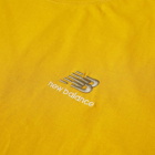 New Balance Uni-ssentials T-Shirt in Varsity Gold