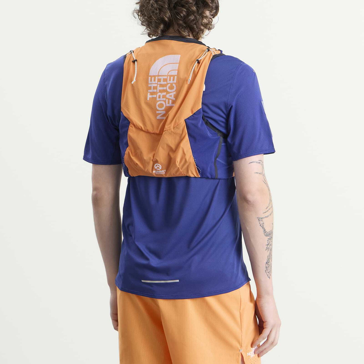 The North Face Men's Summit Run Expedition Vest 10 in Papaya/Bold Blue