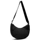 Eastpak Half Moon Cross Body Bag in Puff Checks Black 