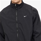 Nike Men's NRG Woven Track Jacket in Black/White