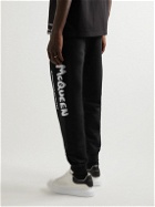 Alexander McQueen - Tapered Logo-Print Loopback Cotton-Jersey Sweatpants - Black