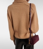 Khaite Kye suede and leather shoulder bag