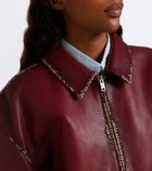 Prada Distressed houndstooth leather jacket