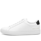 Woman by Common Projects Women's Retro Classic Trainers Sneakers in White/Black