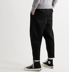 AMI - Tapered Cropped Pleated Cotton-Twill Trousers - Black