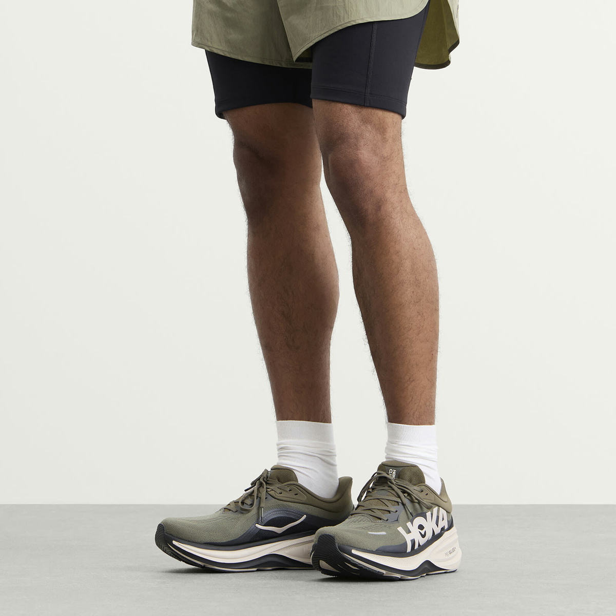 Hoka One One Men's Clifton Pro Sneaker in Antique Olive/River Rock Grey