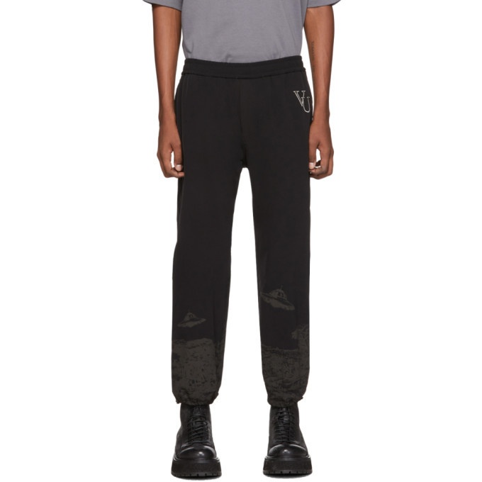 Photo: Undercover Black Valentino Edition Printed Track Pants