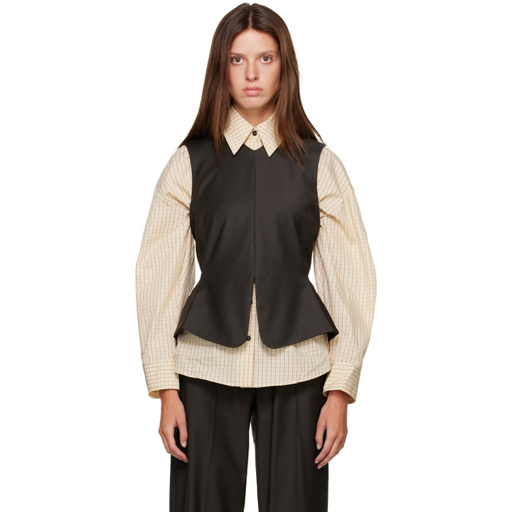 Photo: Cordera Brown Tailored Peplum Top