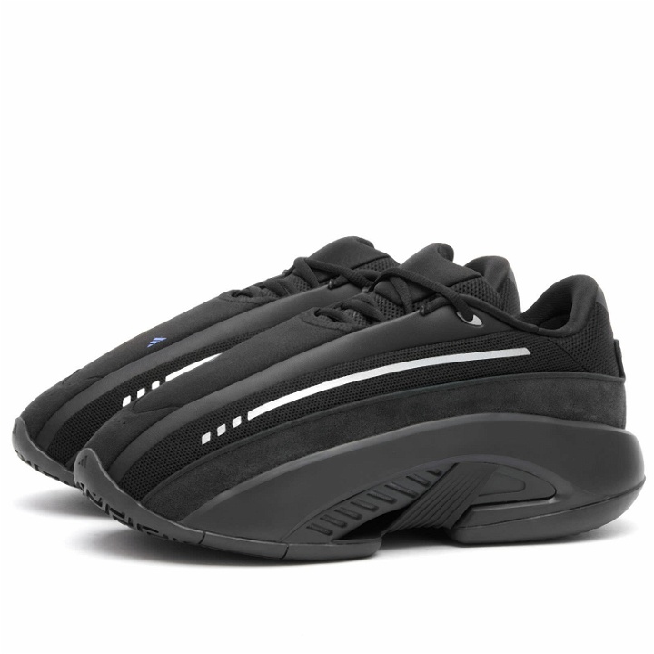 Photo: Adidas Men's SUPERTEAM 2000S 002 Sneakers in Core Black/Carbon/Lucid Blue