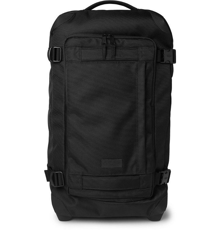 Photo: Eastpak - Tranverz Medium 51cm Leather-Trimmed Canvas Suitcase - Black