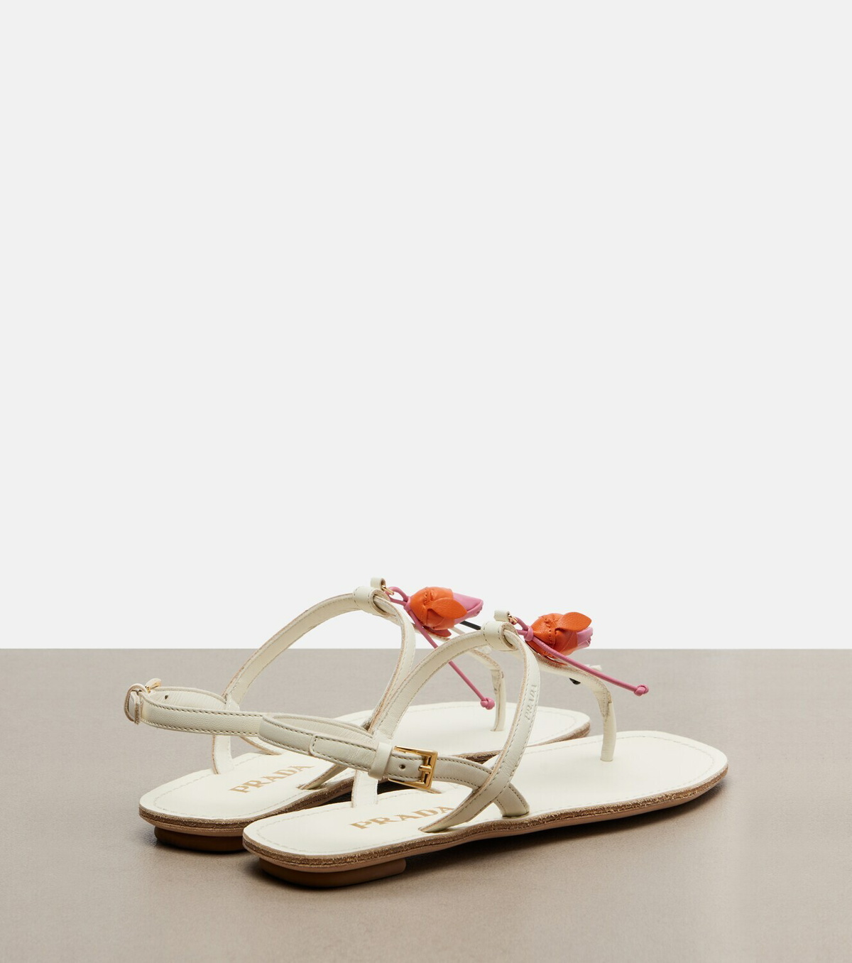 Prada Floral-appliqué leather thong sandals