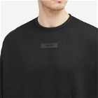 Fear of God ESSENTIALS Men's Spring Tab Detail Sweatshirt in Jet Black