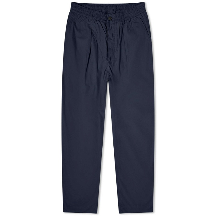 Photo: Universal Works Men's Recycled Poly Oxford Pants in Navy