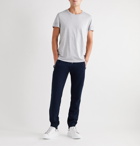 Moncler - Tapered Logo-Print Loopback Cotton-Jersey Sweatpants - Blue