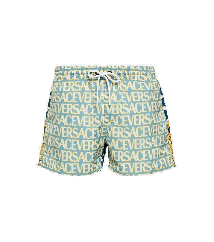 Photo: Versace Logo printed swim trunks