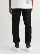 Dolce & Gabbana - Tapered Leopard-Flocked Cotton-Jersey Sweatpants - Black