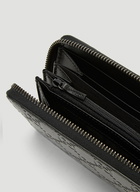 GG Embossed Leather Wallet in Black