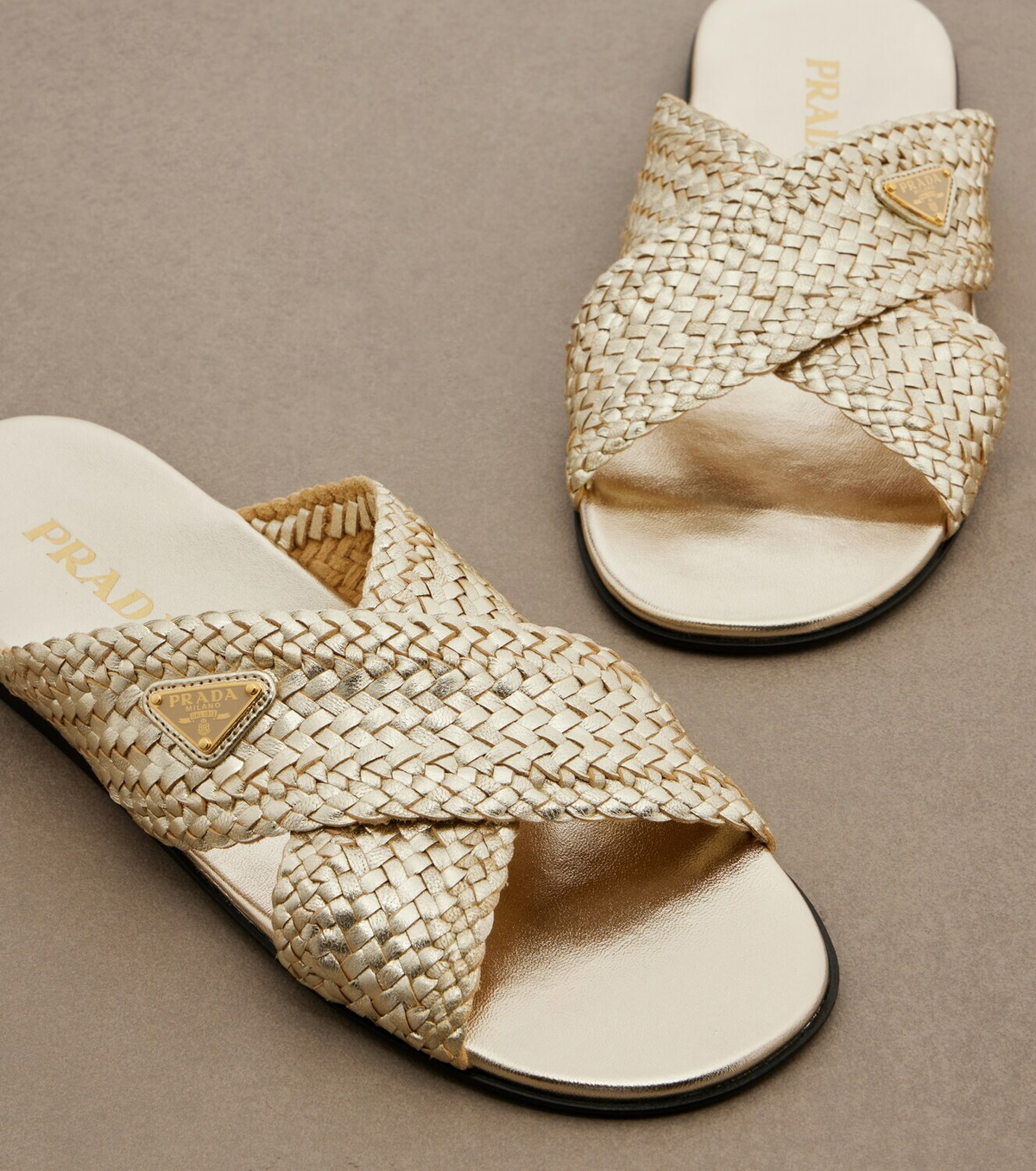 Prada Woven leather slides