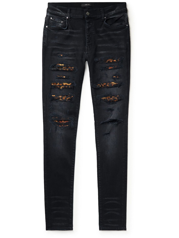Photo: AMIRI - Thrasher Skinny-Fit Distressed Panelled Jeans - Black