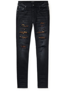 AMIRI - Thrasher Skinny-Fit Distressed Panelled Jeans - Black