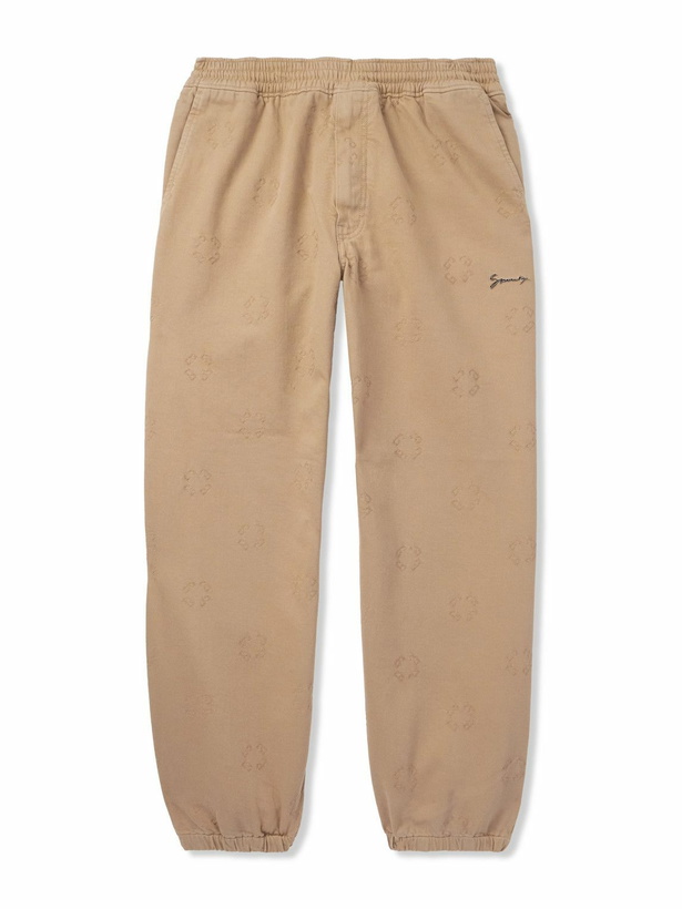 Photo: Givenchy - Tapered Appliquéd Logo-Jacquard Cotton-Blend Twill Trousers - Neutrals
