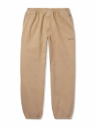Givenchy - Tapered Appliquéd Logo-Jacquard Cotton-Blend Twill Trousers - Neutrals