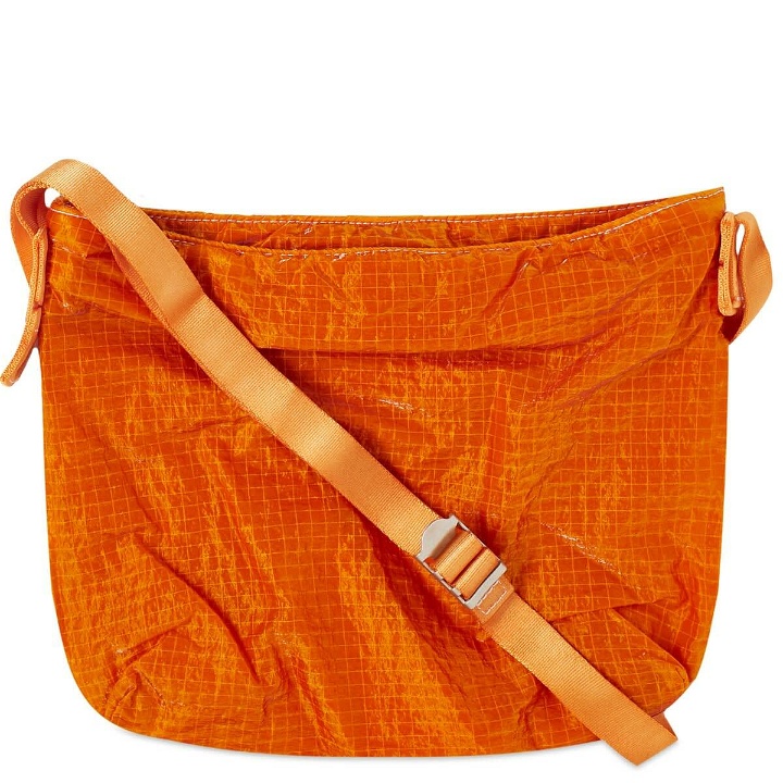 Photo: Hender Scheme Overdyed Cross Body Bag - Small in Orange