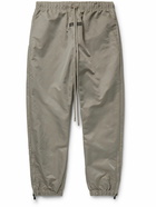 FEAR OF GOD ESSENTIALS - Tapered Logo-Appliquéd Taslan Nylon Track Pants - Brown