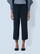 Pleats Please Issey Miyake Pleated Wide-Leg Trousers