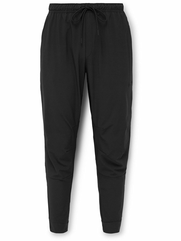 Photo: Nike Training - Unlimited Slim-Fit Tapered Dri-FIT Drawstring Trousers - Black