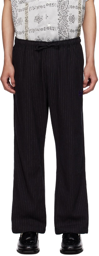 Photo: NEEDLES Black Pinstripe Trousers