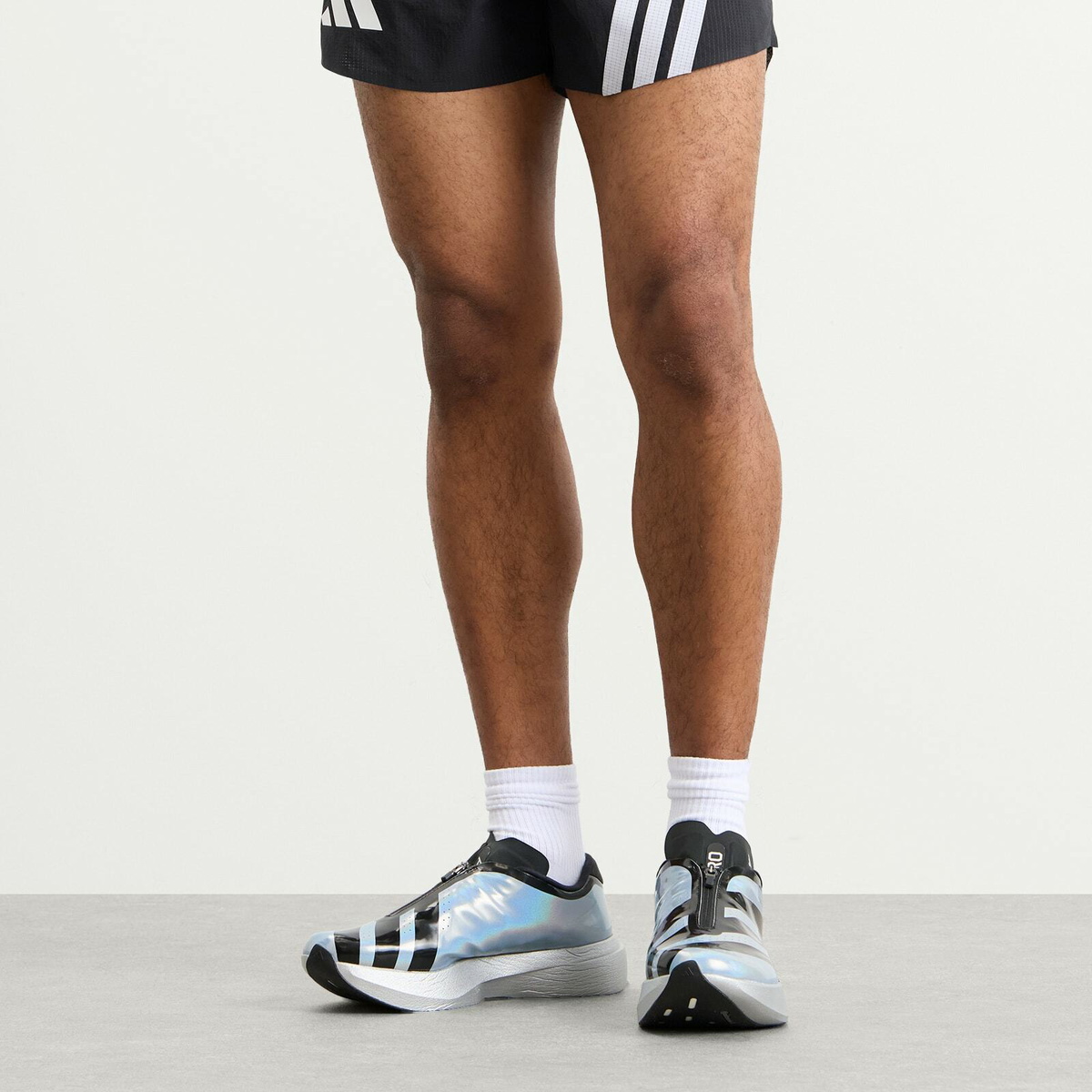Adidas Men's Evo SL Zip Sneaker in Silver Met./Core Black/Halo Silver