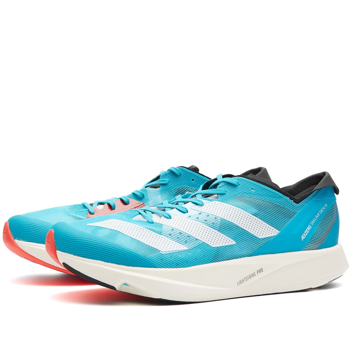 Photo: Adidas Men's Adizero Takumi Sen 9 Sneakers in Ftwr White/Core Black/Lucid Cyan