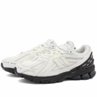 Comme Des Garçons Homme Men's x New Balance 1906 Sneakers in White/Black