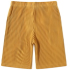 Homme Plissé Issey Miyake Men's Pleated Short in Golden Yellow