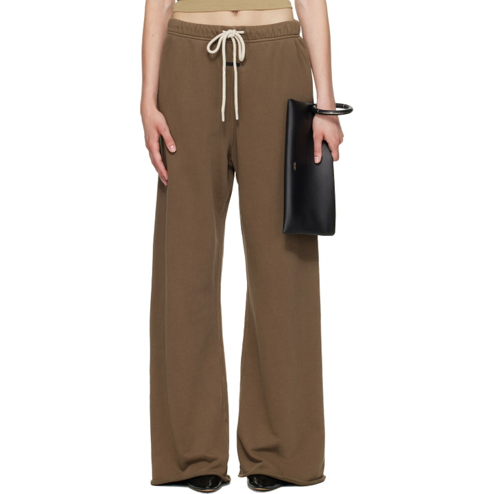 Photo: Fear of God ESSENTIALS Brown Raw Cut Lounge Fit Sweatpants