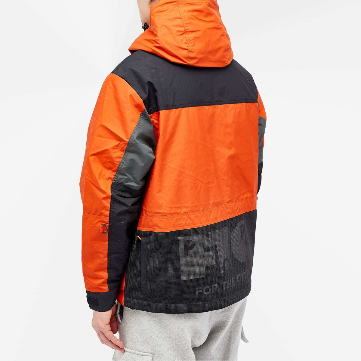 Pop Trading Company Men's x FTC Funnel Neck Jacket in Orange/Black