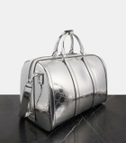 Gucci GG Medium debossed duffel bag