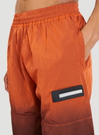 Spray-Dyed Windcheater Pants in Orange