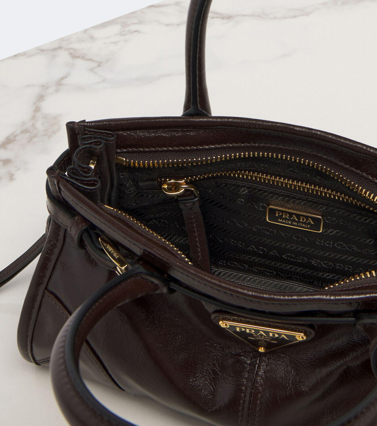 Prada Prada Bonnie Mini leather top-handle bag