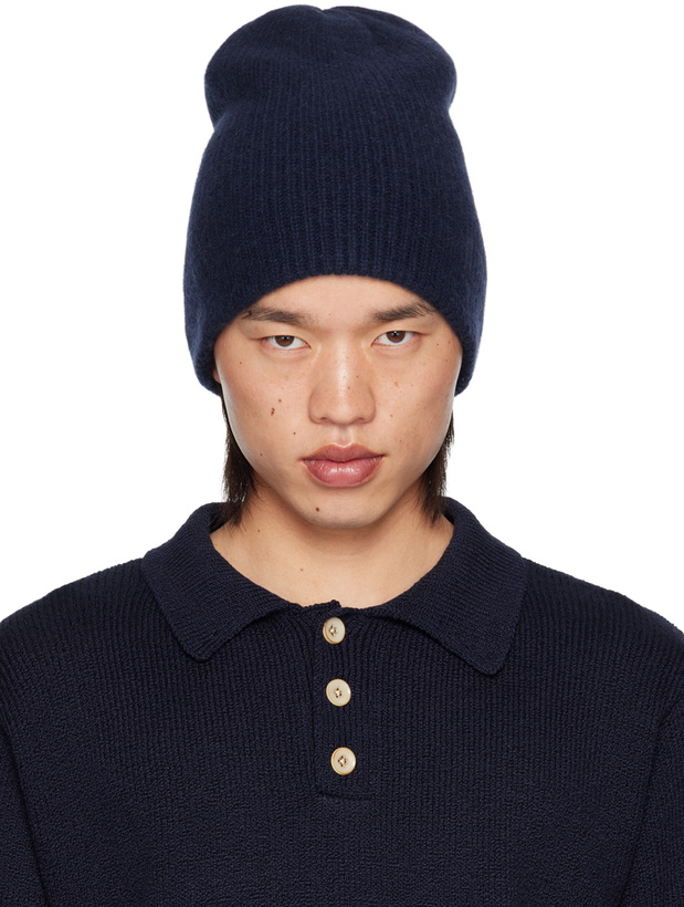 Photo: The Elder Statesman Navy Watchman Beanie