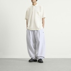 Nanamica Men's Snap Polo Shirt in Off White