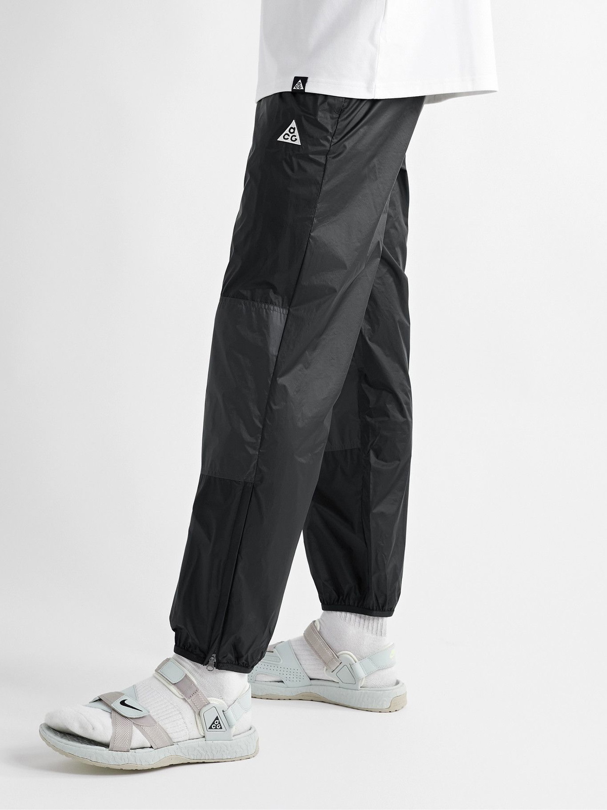 Nike Tapered Logo-print Nylon Track Pants in Black for Men