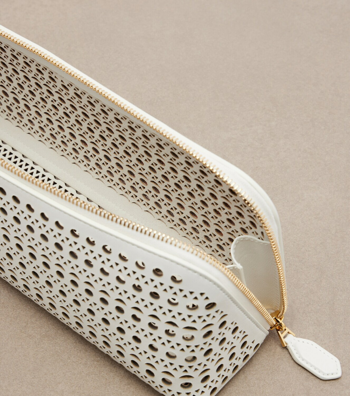 Alaïa Delta Small leather clutch