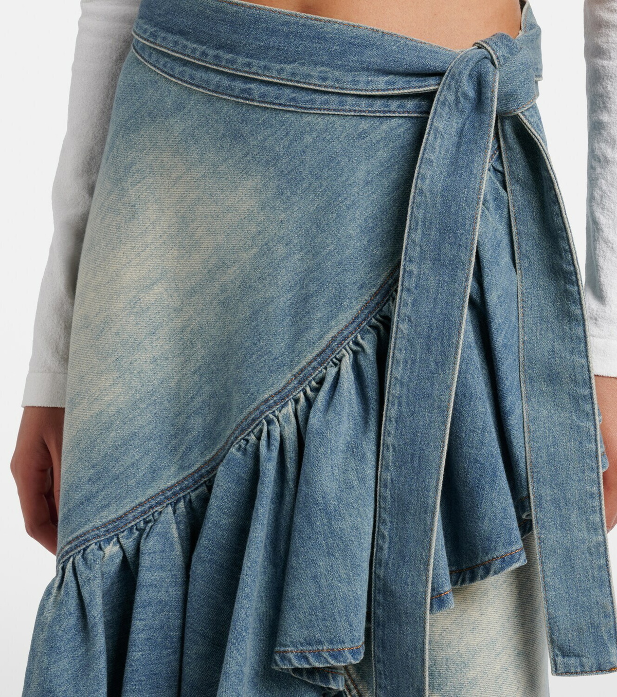 Alaïa Ruffled denim wrap skirt