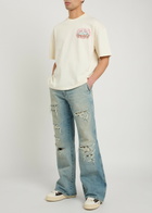 Amiri Checkered Repair Distressed Bootcut Jeans Indigo